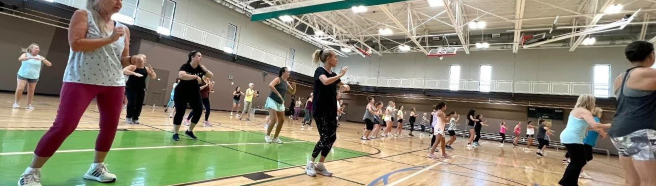 Members participate in a group exercise class at Das Rec