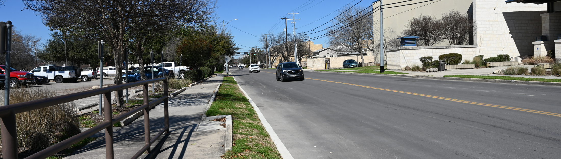 A street-level view of South Castell Avenue near the New Braunfels Civic/Convention Center